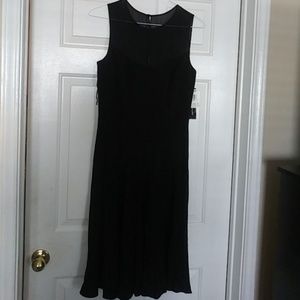 Black sleeveless dress with sheer declate